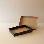 Die Cut Food or other product presentation trays - shown in kraft board & Roller Coated Black 